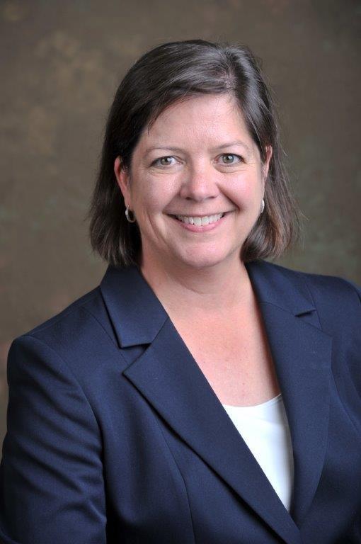 A woman in a blue blazer